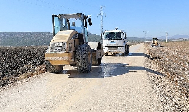 Menderes Belediyesi, İzmir Büyükşehir Belediyesi’nin dayanakları ile mahallelerde üretim yolları yapıyor.