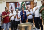 Lider Tugay aşure lokmasını paylaştı